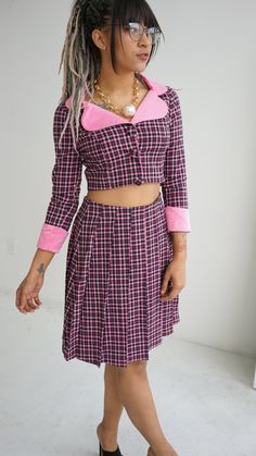 Every cutie needs our Plaid Portrait Collar Jacket with Pleated Skirt Matching Set. Perfect professional look when you need to make a statement. With the pleated skirt and princess pink contrast colors, you are bound to stand out in the crowd. Put your unique self on display and be ready to get tons of compliments at your fashionable interview. The crop jacket is fully lined in a soft charmeuse, paired with a pleated skirt with a side invisible zipper. This cute & unique wool suit set is perfect Skirt Matching Set, Pink Contrast, Pink Friday, Collar Jacket, Wool Suit, Professional Look, Pink Plaid, Suit Set, Crop Jacket