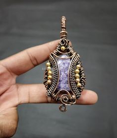 Hello and Welcome To RSJEWELLERYHOUSE , where we present our best designed products. We, self are the designers, makers and sellers. We Have aimed to Supply Good Quality Products  at best prices around. For more details direct message us. Lepidolite Gemstone Pendant Copper Wire Wrapped Pendant Ethnic Jewelry Handmade Pendant Brand New Pendant Gift For Women Copper Wire Jewelry Metal-Copper Gemstone-Lepidolite Lepidolite is very useful for those that need to reduce stress and low mood, by dissipa Hand Wrapped Rectangular Bohemian Jewelry, Bohemian Hand Wrapped Rectangular Jewelry, Handmade Bohemian Rectangular Jewelry, Handmade Purple Rectangular Necklace, Copper Wire Jewelry, Low Mood, Jewelry Metal, Handmade Pendant, Ethnic Jewelry