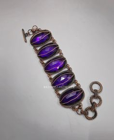 Hello and Welcome To RSJEWELLERYHOUSE , where we present our best designed products. We, self are the designers, makers and sellers. We have aimed to Supply Good Quality Products at best prices around. Faceted Amethyst Bracelet Copper Wire Wrapped Bracelet Gemstone Bracelet Handmade Copper Jewelry Statement Jewelry For Gift For Husband Handmade Copper Bracelet   Metal -Copper Gemstone- Faceted Amethyst Color- Purple  Benefits Of Wearing Amethyst Jewelry- This stone helps those who are stressed out all the time and want to let go of their past traumas. It also lessens sadness and anxiety. Although it is thought that wearing. Amethyst Jewelry has soothing effects on the wearer, natural  amethyst actually strengthens your physical, mental, and spiritual health. Benefits Of Wearing Copper Jewe Handmade Adjustable Metal Crystal Bracelet, Handmade Metal Crystal Bracelet As A Gift, Handmade Purple Metal Bracelets, Purple Metal Bracelets As Gift, Purple Metal Bracelets As A Gift, Handmade Purple Metal Beaded Bracelets, Adjustable Purple Metal Crystal Bracelet, Handmade Copper Bracelet, Handmade Copper Jewelry