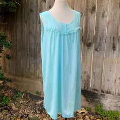 This is a vintage light blue/baby blue/aqua colored nightgown. Feels soft and thin. Nylon like. No original tag. I'd say it's from the 60s-80s. A couple small pinholes on it.  No stains. Very clean. Fits like a size Large possibly XL Measurements as follows: Pit to pit laying flat is 24" inches Length is 37" inches  Hits about knee length. Light Blue Nightgown, Blue Nightgown, Clean Fits, Aqua Color, Blue Baby, Vintage Lighting, Night Gown, Baby Blue, Knee Length