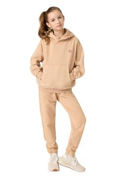 Naturally dyed organic cotton brings sun-faded color to soft, everyday joggers cut for a relaxed, kid-approved fit. Elastic/drawstring waist Front welt pockets 100% organic cotton Machine wash, tumble dry Made in Portugal Beige Cotton Sporty Joggers, Beige Cotton Sweatpants In Athleisure Style, Beige Cotton Athleisure Sweatpants, Sporty Beige Cotton Joggers, Spring Athleisure Sweats With Kangaroo Pocket, Cotton Sweats With Kangaroo Pocket For Everyday, Relaxed Fit Sweats With Kangaroo Pocket For Leisure, Beige Relaxed Fit Joggers For Casual Wear, Beige Relaxed Fit Casual Joggers