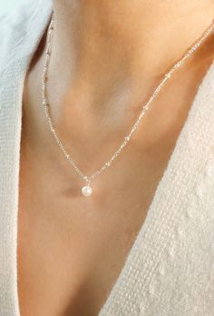 Minimalist Single Pearl Necklace Dainty Silver Pearl Necklace Real Freshwater Pearl Drop Necklace Gift for Bridesmaid Layered Necklace Pearl * Pair a dainty lustrous pearl with a delicate chain of your choice to create your own style! A variety of sterling silver and gold filled chains are available for choice.  * Pearl is the birthstone for the month of June and is also a traditional wedding gift. This beautiful pearl necklace will definitely be perfect as birthday gifts, wedding gifts, bridesm Cheap Single Strand Elegant Pearl Necklace, Silver Pearl Drop Necklace, Cheap Adjustable Pearl Necklace, Sterling Silver Pearl Necklace, Prom Jewlrey Looks Silver, Minimalist Charm Necklace For Party With Delicate Chain, Minimalist Charm Necklace For Party, Minimalist Party Charm Pendant Necklaces, Dainty Sterling Silver Necklace For Party