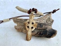 Leather Surfer Necklace with Bone Cross Pendant and Hemp | eBay Casual Brown Necklace With Adjustable Cord, Handmade Rustic White Jewelry, Rustic Handmade White Jewelry, White Rustic Handmade Jewelry, Rustic White Handmade Jewelry, Casual Brown Jewelry For Festivals, Casual Brown Jewelry As Gift, Adjustable Cross Necklace For Festivals, Handmade Brown Cross Jewelry