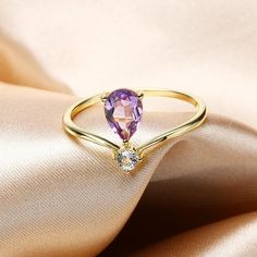 Holiday Notice: We will be on holiday from Feb 6 to Feb 15 for the Spring Festival. Orders will be shipped after we resume work.  Dainty Amethyst Promise Ring, Pear Shape Amethyst Ring Silver, Purple Gemstone Ring, February Birthstone, Alternative Engagement Ring, GiftsFeatures• Made to Order. • Material: 925 Silver with Gold Plated• Gold Color: Yellow Gold• Stone Type: Natural Amethyst and White Topaz• Ring Size: US4.5 - 8.5• Ready to Ship in 7-10 Business Days Want to find out more? Check out Purple Pear-shaped Amethyst Ring With Prong Setting, Pear-shaped Purple Amethyst Ring With Prong Setting, Purple Pear-shaped Ring With Prong Setting, Purple Teardrop Amethyst Ring For Anniversary, Elegant Teardrop Amethyst Ring, Fine Jewelry Teardrop Purple Ring, Elegant Teardrop Purple Amethyst Ring, Fine Jewelry Purple Teardrop Ring, Elegant Purple Teardrop Amethyst Ring