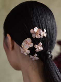 The Florence Hair Pin Set is a dash of sweetness for your tresses. Varying shapes and sizes of ruffled flowers with layers of blush and rose colors are applied by hand accented with golden edges and Swarovski pearl centers for the ultimate finishing touch. Wear using one, two, or all of the pins. Versatile styling ensures these will become a wardrobe staple whenever you want a little something extra in your hair. All flowers are created by hand, sculpted in our studio. Shipping and Production Ti Scrunchies With Pearls, Feminine Hair Accessories, Flower Hair Ornament, U Pins For Hair, Hair Ecssoris, Hair Do With Flowers, Hair Pin Aesthetic, Hair With Roses, Rose Inc Blush