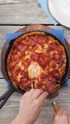 an old cast iron skillet next to some ingredients