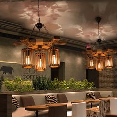 the restaurant is decorated with zebra print and wooden accents, along with modern lighting fixtures