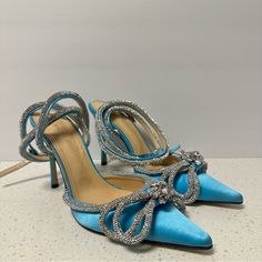 New Without Box - Have Been Tried On Around The House, But Never Ended Up Wearing. Mach & Mach Double Bow Satin Heels Size Eu 38 1/2 Ocean Blue Satin There Is A Number Written On The Underside To Prevent Store Returns Since They Were A Display Brand New, Never Been Worn. Double Bow Embellished Sandals Made In Italy Color/Material: Ocean Blue Satin Design Details: Silver-Tone Hardware, Crystal Embellishments And Double Bow Adjustable Ankle Strap With Buckle Closure Lightly Padded Leather Insole S Mach And Mach Heels Purple, Satin Design, Crystal Sandals, Square Toe Sandals, Double Bow, Bow Sandals, Bow Heels, Satin Heels, Embellished Sandals