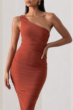 For a wedding guest or race day dress that will captivate but also contour your curves. you needn't look further than this asymmetric midi. Late Night comes in our signature stretch jersey known for it's sculpting and incredible comfort. Style this ruched bodycon dress with gold hoop earrings to complement it's warm rust hue.Features - Premium stretch jersey- Fully ruched- Asymmetric neckline- Single shoulder strap- Bodycon fit- Asymmetric neckline- Midi length Sizing & Fit Model is 5'8" and wears UK size 8 / US size 4 Product Information Designed exclusively by Club L London Fully lined with good stretch Premium jersey in Rust (95% Polyester. 5% Elastane) 110cm total lengthSKU: CL126071 Ruched Midi Dress, Ruched Bodycon Dress, Information Design, Good Stretches, Race Day, Day Dress, Gold Hoop, Gold Hoop Earrings, Late Night