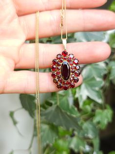 Antique  Bohemian garnet pendant  pendant  Material- gold  Hallmarks   -  333 Gemstones - Natural Bohemian  garnets - Pyrope   pendant Measurements   -    Length     cm  3.3 cm   or   1.29  inches  Weight chain and pendant. - 5.3  gr Chain  Hallmarks 333 gold  Measurements- 42 cm - 16.53 cm good  vintage condition. You can buy separately chain or pendant  just let me know.  Don't forget visit my collection  https://myoldvintage.etsy.com 🔥Pleas not , the price just 1 pendant and chain , the pend Fine Jewelry Yellow Gold Garnet Necklaces, Faceted Garnet Jewelry In Yellow Gold, Yellow Gold Garnet Jewelry, Antique Garnet Gemstone Jewelry, Antique Garnet Pendant Necklace, Antique Ruby Gemstone Necklace, Fine Jewelry Garnet Pendant, Victorian Ruby Pendant Jewelry, Yellow Gold Garnet Pendant Jewelry