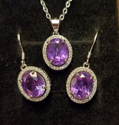 "Sparkly Beautiful Color Change From Purple To Magenta Lab Created Alexandrite Earrings And Matching Necklace Set. 8x10mm Gems, 925 Sterling Silver Settings With Crystal Halos And 18\" Sterling Chain. Chain Length Options Available By Messaging Seller At Time Of Purchase. Great Gift! Gift Box Included." Elegant Jewelry With Sterling Silver Clasp And Oval Pendant, Sterling Silver Necklace With Matching Earrings For Formal Events, Oval Jewelry With Sparkling Stones For Gift, Oval Pendant Jewelry Set For Anniversary, Silver Oval Jewelry Sets With Matching Earrings, Sterling Silver Necklace With Matching Earrings For Anniversary, Sterling Silver Necklaces With Matching Earrings, Sterling Silver Necklaces With Matching Earrings For Anniversary, Sterling Silver Jewelry With Purple Sterling Silver Clasp