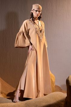 Caramel brown tulip sleeves floor length V neck kurta with dangling pearl, sequin, glass bead tassels embellishments on the neckline. Paired with a bustier. - Aza Fashions Elegant Brown Festive Kaftan, Festive Brown Elegant Kaftan, V Neck Kurta, Bead Tassels, Tulip Sleeve, Luxury Sale, Caramel Brown, Fashion App, Beaded Tassels