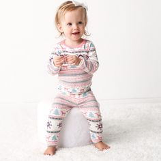 Made with super soft Lenzing Micromodal© these matching pant and top sets will keep your little one super cozy and snuggly. 95% Lenzing Micromodal© and 5% spandex Wash cold with like colors; stays soft wash after wash Fits snug; not treated with flame retardants Pink Reindeer Pajamas, Matching Pants And Top Set, Birthday Gift Boxes, Baby Gift Baskets, Reindeer Pajamas, Pink Pajama, Pink Pajamas, Facebook Style, Gift Giver