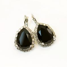 Black Earrings Crystal Clear Black teardrop Black Chandelier Earrings Black Drop Earrings Halo earrings premium rhinestones,Silver, SE101 A sparkly pair of leverback drop earrings made with genuine 13/18mm premium high quality crystals. Surrounded by small sparkling crystals. Total size of the earring: Length 30mm Width: 16mm Sparkly and Colorful, Hard to ignore. Check the additional photos to choose more colors. There are matching necklaces rings and bracelets to go with it in my shop. All item Crystal Teardrop Earrings For Evening, Evening Teardrop Chandelier Earrings With Sparkling Stones, Teardrop Crystal Earrings For Evening, Evening Teardrop Earrings With Rhinestones, Evening Teardrop Crystal Earrings, Sparkling Teardrop Earrings For Evening, Black Crystal Chandelier Earrings, Evening Teardrop Crystal Earrings For Pierced Ears, Sparkling Drop Teardrop Earrings For Evening