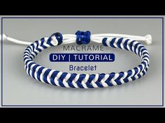 the macrame bracelet is made with blue and white stripes