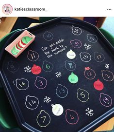 a black tray with writing on it and some magnets attached to the lid that says, i can't wait for christmas