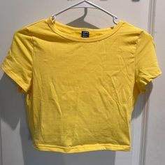 Medium Yellow Shein Crop Top Never Worn!! #Yellow #Croptop #Shein #Cute #Comfy Trendy Yellow Stretch T-shirt, Trendy Stretch Yellow T-shirt, Yellow Cotton Short Sleeve Crop Top, Yellow Cotton Crop Top With Short Sleeves, Yellow Cropped Stretch Tops, Yellow Stretch Short Sleeve Crop Top, Fitted Neon Yellow Casual Tops, Casual Yellow Cropped Crop Top, Trendy Yellow Crew Neck Crop Top