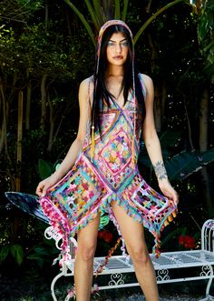 Feel like you're a sprite that just woke up inside a flower in this romantic, colorful and sexy dress. Crochet with floral details in each granny square and ruffling spirals create a psychedelic effect. Button details featured at back and adjustable hand braided straps. All garments are made to order and made to size. Handmade in Los Angeles 100% Rayon Yarn Bohemian Sleeveless Crochet Dress In Pink, Fitted Multicolor Boho Dress For Vacation, Hippie Multicolor Dresses For Spring, Fitted Multicolor Boho Dress For Summer, Spring Hippie Multicolor Dresses, Spring Multicolor Hippie Dresses, Whimsical Summer Mini Dress, Bohemian Multicolor Mini Dress For Garden Party, Pink Bohemian Crochet Dress For Party