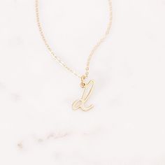 Understated and chic, the Nella Mini Initial Pendant lets you wear your initial or the initial of someone you love with a lowercase letter charm that can be worn on its own or layered with other pieces. Available in sterling silver, 18k gold plated or 18k rose gold plated silver Size: 1/4 to 1/2" (varies by letter) 16" cable chain with 2" extender Spring ring closure Made in the USA This is a lowercase only font, uppercase letters entered will be produced as lowercase This item is FINAL SALE and Dainty Initial Necklace With Charms For Personalized Gift, Minimalist Initial Necklace With Charms For Personalized Gift, Minimalist Charms Initial Necklace For Personalized Gift, Minimalist Initial Necklace With Charms As Personalized Gift, Dainty Initial Necklace With Charms, Classic Initial Pendant Charm Necklaces, Minimalist Initial Pendant Name Necklace In White Gold, Classic Initial Pendant Charm Necklace, Dainty Initial Pendant Name Necklace With Charms