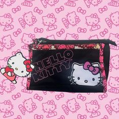 New With Tags Hello Kitty Black And Pink Mcbling Wallet From 2011 Super Cute Sanrio Hello Kitty Wallet, Mini Purse Perfect Condition From 2011 Zipper Wallet Can Hold Phone Dimensions: 7.25 Inches By 5.5 Inches Pink Pouch With Cell Phone Pocket, Cute Black Bag With Zipper Pouch, Cute Black Zipper Pouch Bag, Pink Pouch With Cell Phone Pocket For Personal Use, Black Pencil Case With Removable Pouch, Cute Pink Pencil Case With Removable Pouch, Pink Rectangular Kawaii Coin Purse, Trendy Black Coin Purse For Personal Use, Trendy Black Pencil Case With Zipper Pouch