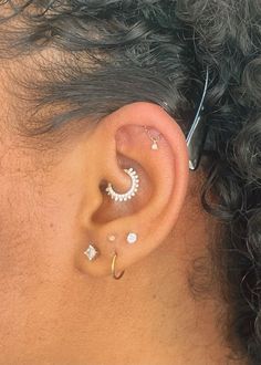 a person with ear piercings on their ears