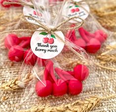 small red hearts are wrapped in cellophane and tied with twine