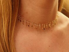 "Copy and paste into your browser, get 15% off ➔ https://bit.ly/VD15OFF The Emilia gold filled choker necklace features dangling cubic zirconia on a cable chain. DETAILS: -One necklace -15 inch 14/20 gold filled choker necklace -Spring ring clasp You will receive one 14k gold filled choker necklace. **Every item is handmade, this means that each will be unique and may not look EXACTLY like the picture, but it will look very similar ➡ORDER PROBLEMS If there are any problems with your order please Gold Dangle Charm Necklace For Party, Gold Jewelry With Dangling Charms For Birthday, Gold Party Jewelry With Dangling Charms, Gold Necklace With Dangling Charms For Birthday, Gold Dangle Necklace For Birthday, Gold Alloy Choker As A Gift, Gift Yellow Gold Metal Choker, Adjustable Gold-tone Choker For Gift, Everyday Gold Necklace