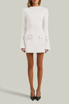 Buy White long sleeve a line pocket mini dress for only $208.00 at HEIRESS BEVERLY HILLS! Spring Mini Dress With Structured Boning, White Fitted Mini Dress With Structured Shoulders, Chic A-line Mini Dress With Pockets, Modern Structured Fitted Mini Dress, Chic Fitted Seamed Dress, Fitted Mini Dress With Structured Boning, Formal A-line Dresses With Pockets, Formal White Dress With Pockets, Long Sleeve Dresses With French Seams For Work