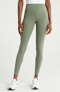 These performance leggings feature a high waist for smoothing coverage and a minimal seam design so they feel like a second skin through every activity. Pull-on style UPF 50+ sun protection 80% nylon, 20% polyester Machine wash, line dry Imported Athleisure High Waist Leggings With 4-way Stretch, High Rise Leggings With 4-way Stretch, Functional Green Elastane Yoga Pants, High Rise Sporty Leggings With 4-way Stretch, Sporty High Rise Leggings With 4-way Stretch, Versatile High Waist Tight Activewear, Versatile High Rise Sports Leggings, Versatile High-rise Sports Leggings, Solid Mid-rise High Stretch Activewear