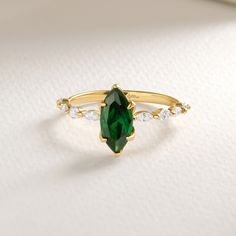 Marquise Emerald Engagement Ring Gold, Unique Green Gemstone Rings Women, 14K Solid Gold Birthstone Ring With Simulated Diamond Gift for Her - Etsy Green Marquise Emerald Rings, Gold Marquise Emerald Ring In 14k Gold, Emerald Marquise Promise Ring For May Birthstone, Marquise Emerald Ring For Promise In May, Green Marquise Cut Emerald Ring, Emerald Marquise Ring For May Birthstone, Green Marquise Emerald Ring For Anniversary, Marquise Emerald Ring For May Birthstone, Marquise Emerald Ring In Yellow Gold