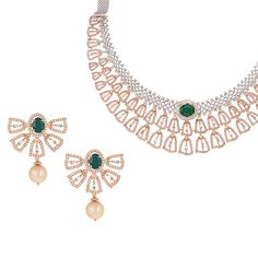 Top Luxe Jewelry: Dazzle in this designer necklace and earrings set, crafted in 18 karat white and rose gold, a statement piece that every woman desires. This exclusive 3-piece necklace set is encrusted with 1688 round brilliant and baguette diamonds (10.91 cts) and features interchangeable oval gemstones- ruby, emeralds & blue sapphire for a diverse look. The broad back chain within the necklace is marginally adjustable in length and fastens with a hook closure. The matching south sea pearl dro Emerald Necklace With Diamond In Fine Jewelry Style, Elegant Diamond Emerald Fine Jewelry Necklace, Elegant Emerald And Diamond Necklace, Hand Set Diamond Pendant Necklaces, Elegant Diamond Jewelry Sets With Stones, Detachable Round Diamond Pendant Necklace, Traditional Diamond Necklace With Stones, Hand Set Diamond Pendant Necklace, Diamond White Jewelry With Stones