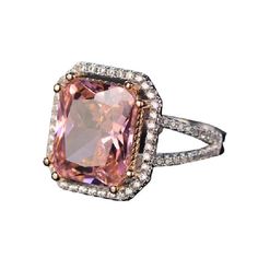 Introducing our Pink Quartz Geometric Ring! This beautiful statement piece is made with 925 Sterling Silver and features a stunning pink quartz stone in a geometric cut. The perfect addition to any jewelry collection, this ring is cute, romantic, and fashionable. The pink color is perfect for any season, and the 10x12 MM stone size makes it a stand-out piece. The ring weight is 6g. Pink Quartz is a great stone to carry with you if your goal is love. It's soothing color can calm feelings of anger