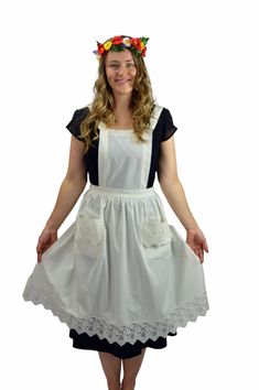 Practical and charming best describes this apron. It is a "working" apron that elegantly combines the Victorian and European style of deluxe rose lace in its design. The deluxe rose apron line is one of our best sellers!  Approximate Dimensions (Length x Width x Height): 36x38x".1 Material Type: 50% Cotton / 50% Polyes Victorian Aprons, Victorian Maid, Apron White, Lace Apron, Lace Costume, Vintage Apron, Victorian Costume, Festival Costumes, Victorian Lace