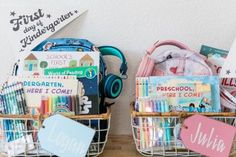 two baskets filled with books and school supplies