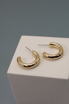 An elegant charming unique must have trending sets of earrings that is made into a mini trio hoop earrings set design. Perfect for casual events and daily wear. This will look great with your romper or puff hem dress.DIMENSION length: .75"' - .5"width: .75" - .5" earring back: postmetal finish: Gold Platingproduct: Lead & Nickel Compliantanti-tarnish: Double E-coating Trendy Gold Cartilage Earrings, Trendy Gold Huggie Earrings, Trendy Gold Cartilage Earrings For Everyday, Trendy Everyday Gold Cartilage Earrings, Earring Sets, Hoop Earring Sets, Huggie Hoop Earrings, Hem Dress, Set Design