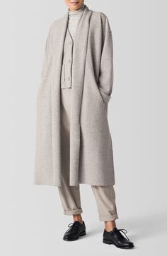 Stay warm and cozy in this soft felted coat constructed from responsibly sourced boiled wool in a slouchy silhouette. 45 1/2" length Open front Shawl collar Front welt pockets 100% wool Dry clean Imported Boiled Wool Coat, Vests For Women, Womens Coats, Boiled Wool, Ethereal Art, Shawl Collar, Work Casual, Coat Dress, Eileen Fisher