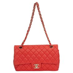 Chanel Red Quilted Classic Flap Bag in Lambskin Leather features an intertwined chain leather strap and a gold CC logo closure. There is one zipper pocket in the interior and a rear slip pocket on rear exterior. Shoulder drop 9"/18". Collection 12. Comes with hologram, id card, booklet and original dust cover. Shoulder Bag With Cc Turnlock Closure For Shopping, Everyday Clutch Bag With Cc Turnlock Closure, Clutch Bags With Cc Turnlock Closure For Everyday, Cc Turnlock Clutch Bag, Classic Red Shoulder Bag With Cc Turnlock Closure, Red Bags With Gold-tone Hardware For Everyday Luxury, Luxury Red Shoulder Bag With Cc Turnlock Closure, Luxury Flap Bag With Chain Strap For Shopping, Chic Red Bags For Everyday Luxury