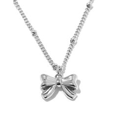 Tie up your look in style with the Ava Necklace. This fashion-forward piece features a chic bow knot pendant, crafted from gleaming 18k gold-plated stainless steel. Lightweight, hypoallergenic, and water-resistant, it's the perfect everyday necklace that adds a touch of feminine flair to any outfit. 18k Gold-Plated Stainless Steel Polished Bow Knot Pendant Lightweight & Hypoallergenic Tarnish-Resistant 16" + 2" extender Chic Metal Jewelry With Bow Detail, Chic Ribbon Necklace For Gift, Chic Ribbon Necklace Perfect For Gifts, Chic Silver Jewelry With Ribbon, Minimalist Party Jewelry With Bow, Chic Bow Necklace For Gift, Chic Silver Jewelry With Bow Tie Detail, Trendy Jewelry With Butterfly Knot For Gift, Trendy Butterfly Knot Jewelry For Gifts