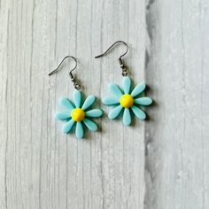 This simple, cute and lightweight earring is great for everyday wear, also it is a perfect gift for the person loves flowers 📌 You will receive one pair of the earring  📌 Each pair of earrings come with clear silicone backs  📌 Color of the earring cards & packing bags varies pending what I have in stock! 📌All order will be shipped within 1-3 business days of purchase  📌All order are handing with great care and checked thoroughly before it is shipped to you  ❗️ENJOY FREE STANDARD DOMESTIC SHIPPING WHEN YOU SPEND $35+  ❤️Favorite my shop for updates on new items or sale event ❤️ Thanks for visiting my shop, hope you find something you like, my goal is to make you smile when you receive your order ❤️ Cute Hypoallergenic Flower-shaped Earrings, Cute Flower Shaped Hypoallergenic Earrings, Everyday Dangle Earrings With Flower Charm, Casual Spring Earrings Perfect For Gifts, Casual Spring Earrings For Gift, Cute Flower Charm Earrings For Everyday, Cute Flower-shaped Earrings With Ear Wire, Cute Everyday Earrings With Flower Charm, Cute Flower-shaped Pierced Earrings