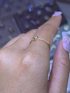 MaterialsGold, Diamond DescriptionUp for sale is a beautiful 14K Gold Bezel Diamond Heart Band. Specifications:-Model #: DHODS550-Metal Type: Rose, Yellow, and White Gold-Metal Purity: 14K-Band Width: 1MM-Gold Weight: 1.19 grams, approx. depending on ring size-Total Diamond Weight: 0.15 carats approx.-Color: F-G-Clarity: SI Brief Overview:-Free Sizing W/ Purchase-14 Day Return Policy-Conflict Free Diamonds-Satisfaction GuaranteeSatisfaction Guarantee:David's House of Diamonds is dedicated to bri Rose Cut Diamond Heart Wedding Ring, Wedding Heart Ring With Rose Cut Diamonds, 14k Gold Heart Cut Diamond Jewelry, Heart Cut Ring With Rose Cut Diamonds, Diamond Heart Ring With Rose Cut For Gift, 14k Gold Heart Cut Rose Diamonds Jewelry, Fine Jewelry Heart Ring With Rose Cut Diamonds, Heart Ring With Rose Cut Diamonds As A Gift, Elegant Gold Diamond Ring For Valentine's Day