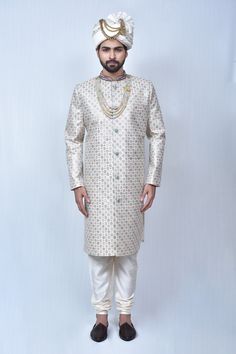 Multicolor sherwani with floral embroidered motifs and welt pocket in front. Comes with cream churidar.
Components: 2
Pattern: Embroidery
Type Of Work: Thread
Neckline: Mandarin Collar
Sleeve Type: Long
Fabric: Art Silk, Silk Blend
Color: Multi Color
Other Details: 
Welt pocket in front
Slits on the sides
Closure: Button front
Note: The mala and safa worn by the model is not for sale
Occasion: Groom - Aza Fashions Embroidered Motifs, Rohit Bal, Tarun Tahiliani, Thread Art, Pattern Embroidery, Color Art, Silk Embroidery, Fashion App, Churidar