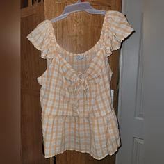 2xl Sweet Rain Orange Creamsicle Gingham Top Nwt. This Top Is True To Size And Sooo Cute For Warm Weather! It Has Ties In The Front To Adjust How Tight You Want The Bodice. It Also Has Bell Sleeves With Open Underarm Areas For A Super Breathable Feel. Get All The Fun Summer Feels In This Adorable Top! Summer Gingham Top For Day Out, Gingham Tops For Beach In Spring, Gingham Ruffle Tops For Vacation, Gingham Ruffled Tops For Vacation, Casual Gingham Top For Picnic, Casual Gingham Tops For Beach, Plaid Short Sleeve Beach Top, Cotton Gingham Tops For Vacation, White Summer Tops For Picnic