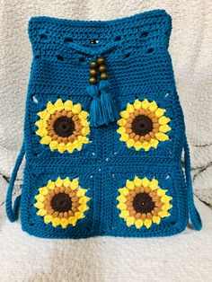 This Sunflower Backpack is made of soft cotton and can be made in any color you wish! You can also choose between sunflowers and daisies!  The finished bag is 16 inches tall, 12 inches wide and 5 inches deep. The strap is soft and comfortable to wear and the pack is fully lined with a stiff cotton to keep the bag's shape and provide sturdiness for your items.  This is a must have item for the girl on the go! Let us know your colors and we will create one just for you! As always, shipping is free Handmade Cotton Backpack, Summer Cotton Backpack, Summer Cotton Backpack For Daily Use, Yellow Summer Backpack For Everyday Use, Yellow Backpack For Everyday Summer Use, Sunflowers And Daisies, New Hampton, The Pack, Must Have Items