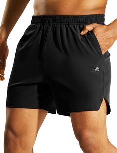 PRICES MAY VARY. Lightweight & Breathable Fabric: Mens 5" athletic running shorts without liner are made of lightweight and stretchy polyester for durability, with a DWR (durable water repellent) finish that sheds light moisture cool and dry 2 Pockets: Two deep side pockets can safely protect your phone or other valuables during athletic Split Hem Design: These lightweight, quick-drying athletic shorts have a split hem to keep you agile. Wear these Sweat-wicking, multi-sport shorts for pretty mu Fast Workouts, Running Shorts Men, Athletic Running, Running Workout, Active Wear Shorts, Active Shorts, Athletic Men, Gym Shorts, Workout Gym