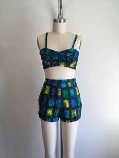 "My new favorite swimsuit! Vintage 50's / 60's bikini. Cotton fabric, hooks on top, metal zipper & button on shorts. Shorts are not lined. Bikini Top: Fit: Xs/Sm Bust: to 32\" Under bust: 28\" Condition: nothing noted. Bottoms: Fit: Xs/Sm Waist: tight 27\" Hip: 37\" Rise: 13.5\" Brand: Myers Condition: nothing noted. *All sales are final, please ask any questions before purchasing. *Each monitor shows color differently and it is subjective, please email me if you have questions concerning co 60s Swimsuit, Swimsuit Vintage, Modest Swim, Vintage Bathing Suits, Vintage Swimsuits, Printed Skirts, Vintage 1950s, Playsuit, Women Swimsuits