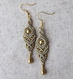 Beautiful Macrame Earrings brass beads. Raw Brass posts. Waterproof and non tarnish. Brass Dangle Earrings With Gold Beads, Gold Beads Brass Dangle Earrings, Nickel-free Beige Bohemian Jewelry, Bohemian Nickel-free Beige Jewelry, Handmade Beige Dangle Jewelry, Beige Handmade Dangle Jewelry, Beige Teardrop Bohemian Jewelry, Bohemian Beige Teardrop Jewelry, Beige Bohemian Teardrop Jewelry