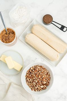 the ingredients to make an oatmeal smoothie laid out on a table