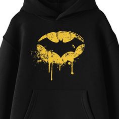 Celebrate the Dark Knight with this Batman sweatshirt. The hoodie features an image of the Batman logo in a dripping yellow circle. The sweatshirt comes in black with a double-lined hood and a large pouch pocket. Batman fans will love this comfy and cozy hoodie. Black Hooded Sweatshirt With Graphic Design, Winter Black Hoodie With Graphic Design, Winter Black Graphic Hoodie, Winter Graphic Design Black Hoodie, Black Halloween Hoodie With Graphic Print, Black Hip Hop Sweatshirt With Graphic Design, Hip Hop Black Sweatshirt With Graphic Design, Black Crew Neck Hoodie With Graphic Design, Black Graphic Hoodie With Crew Neck