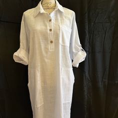 New, Beach Wear, Long White Shirt Style Collared Dress, 3 Buttons Opening On Front, Roll Tab Sleeve, 3 Front Pockets And Slits On The Sides, Armpit To Armpit 23”, Length 48”, Summer, Casual, New , Never Used Size Xl Summer Vacation Blouse With Pockets, Casual Beach Tunic With 3/4 Sleeves, White Beach Shirt Dress With Pockets, Casual 3/4 Sleeve Beach Tunic, White Shirt Dress With Pockets For Beach, White Shirt Dress With Pockets For The Beach, Casual Beach Shift Shirt Dress, Casual Tunic With 3/4 Sleeves For Vacation, Summer Beach Dresses With Roll-up Sleeves