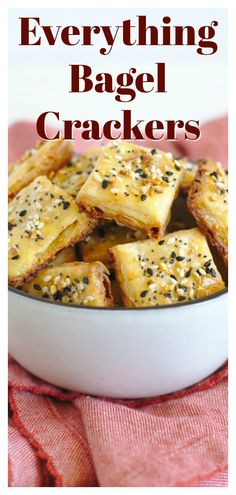 everything bagel crackers in a white bowl on a pink towel with text overlay